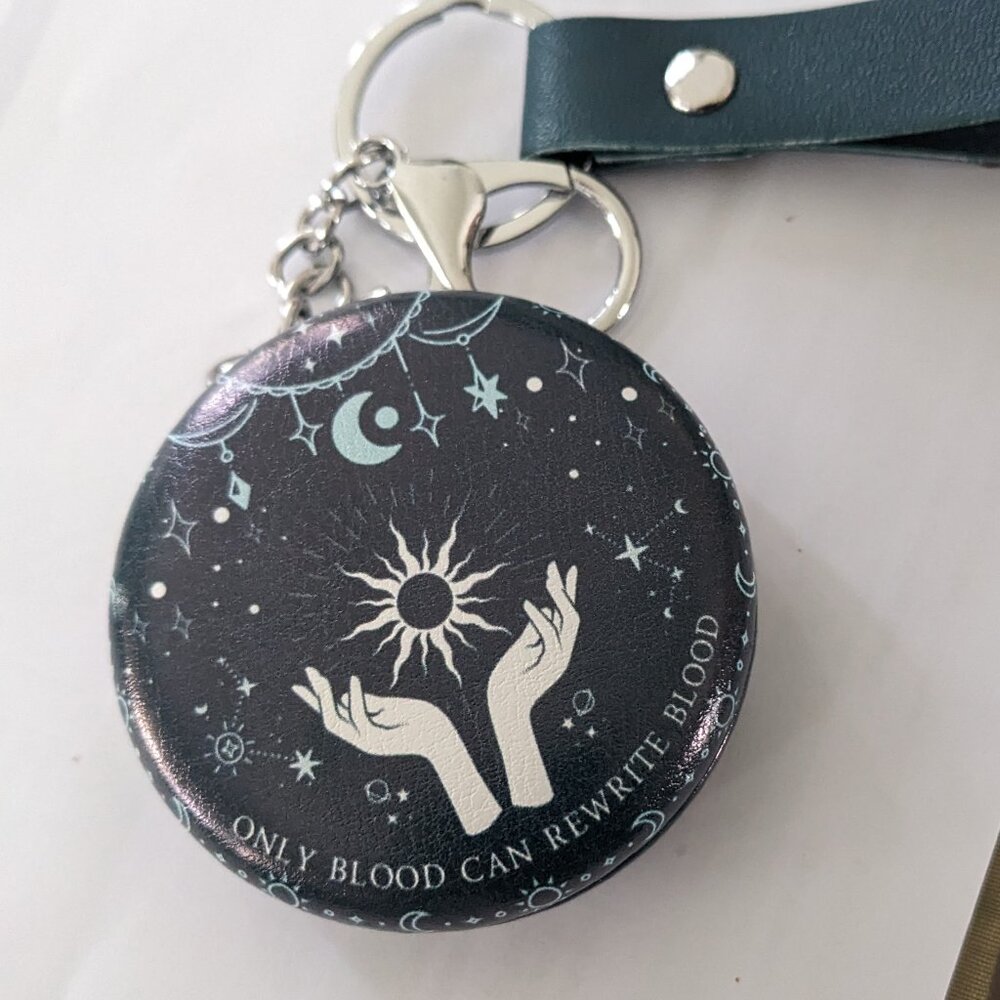 Evocation inspired keychain mirror